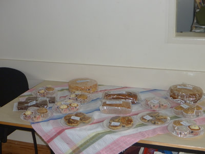 Cakes for sale to help raise funds to purchase a defibrillator for each village.
